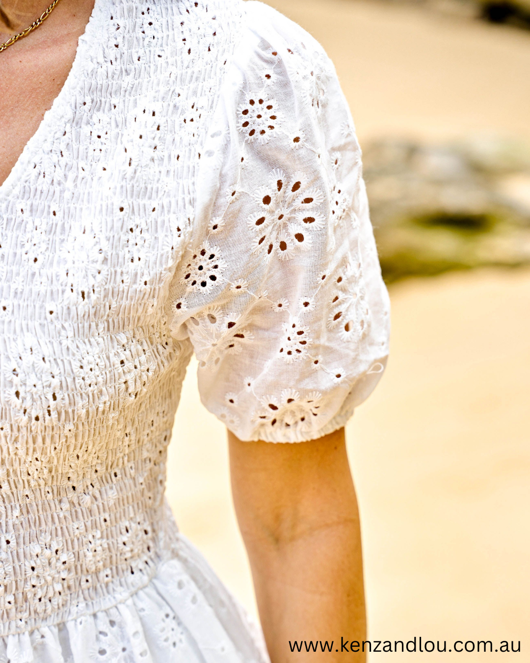 Sleeve view White Boho Mini Dress Brodie Anglaise Cotton Dress Lined White Dress 100% Cotton Bohemian Style Cotton Dress Vintage Brodie Anglaise Mini Dress Chic White Boho Attire Feminine Cotton Dress with Anglaise Detail Stylish Bohemian White Dress Lace-Adorned Cotton Mini Dress Classic White Dress with Boho Flair