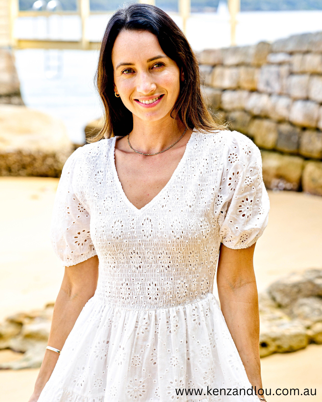 Front view White Boho Mini Dress Brodie Anglaise Cotton Dress Lined White Dress 100% Cotton Bohemian Style Cotton Dress Vintage Brodie Anglaise Mini Dress Chic White Boho Attire Feminine Cotton Dress with Anglaise Detail Stylish Bohemian White Dress Lace-Adorned Cotton Mini Dress Classic White Dress with Boho Flair